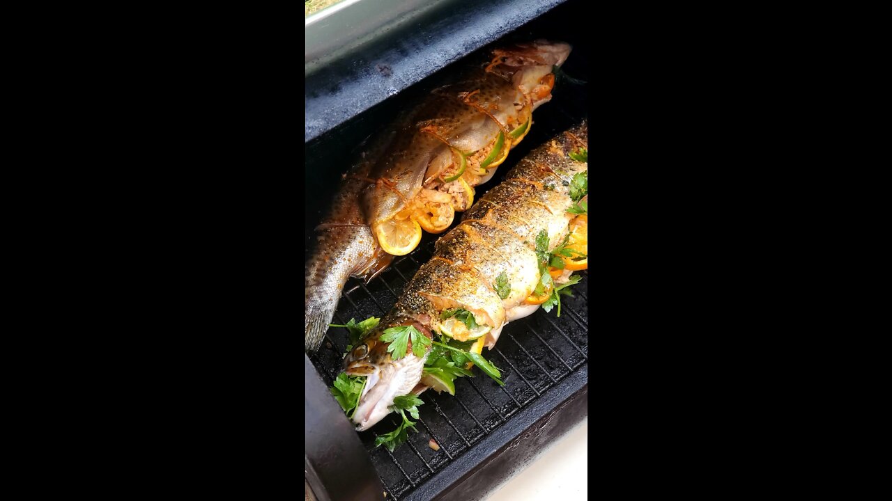 Crab stuffed, smoked whole rainbow trout