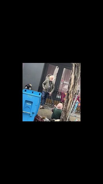 Man sprays homeless woman with hose because she refuses to leave