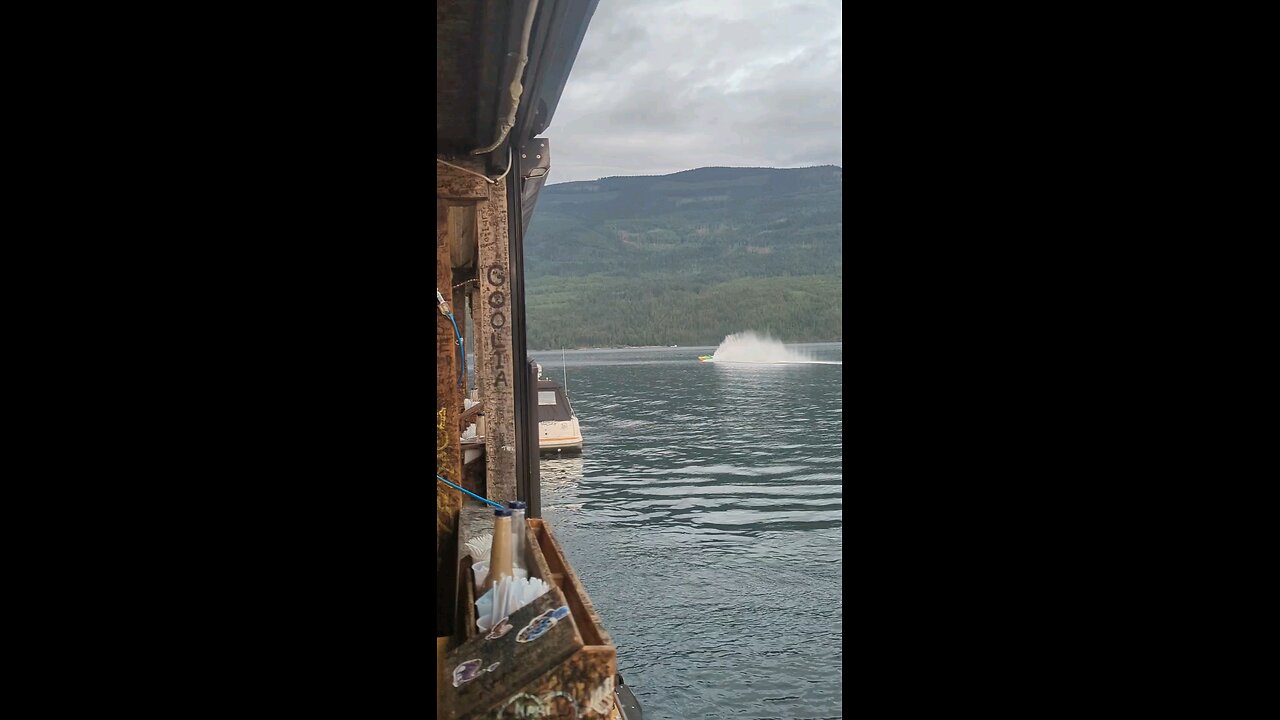 Shuswap cigarette boat on the glass lake