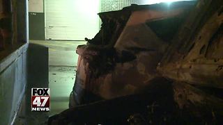 Jeep destroyed after catching fire inside parking garage