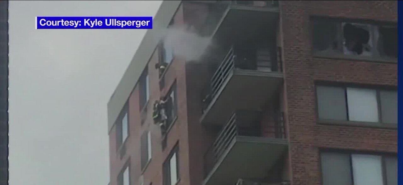 NY firefighters perform a roof rope rescue