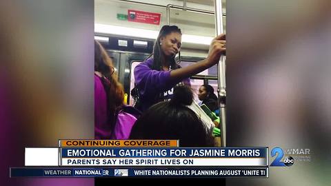 Show of love at emotional vigil for 20-year-old woman found dead in bleachers