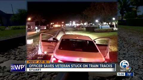 Officer saves veteran stuck on train tracks in Stuart