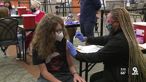 Kids and parents want to feel safe again, so they're lining up to get the COVID-19 vaccine