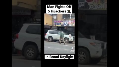 Knife Wielding Man Shields Himself From Car Hijackers | #Shorts