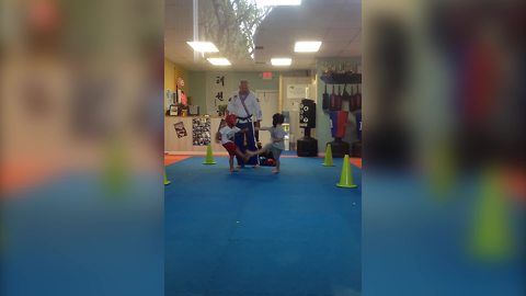 "Two Young Boys Try to Spar in A Taekwondo Gym, But Keep Punching the Air"