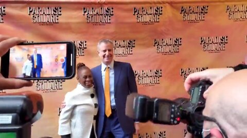 De Blasio and his wife heckled