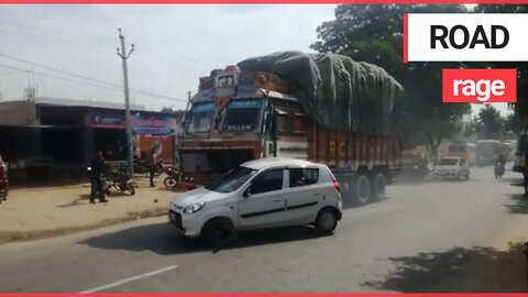 Shocking video shows truck driver PUSHING a car attached to the bonnet for 2km