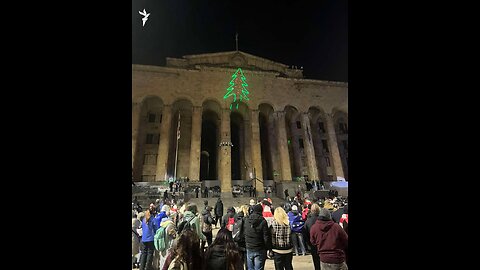 🇬🇪🎉🎉🎉 The Georgian Parliament building under fire from fireworks, but with