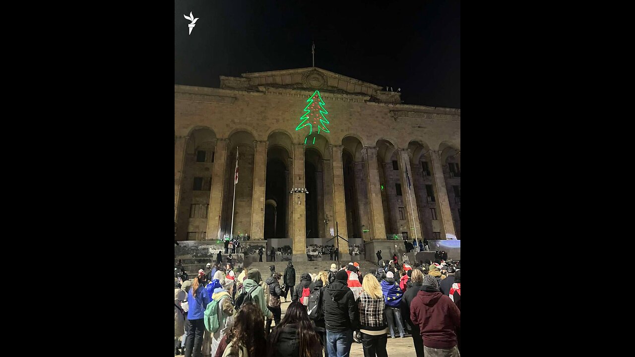 🇬🇪🎉🎉🎉 The Georgian Parliament building under fire from fireworks, but with