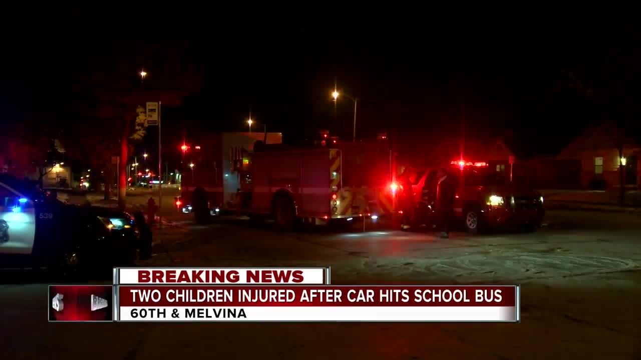 Two children injured after car hits school bus in Milwaukee