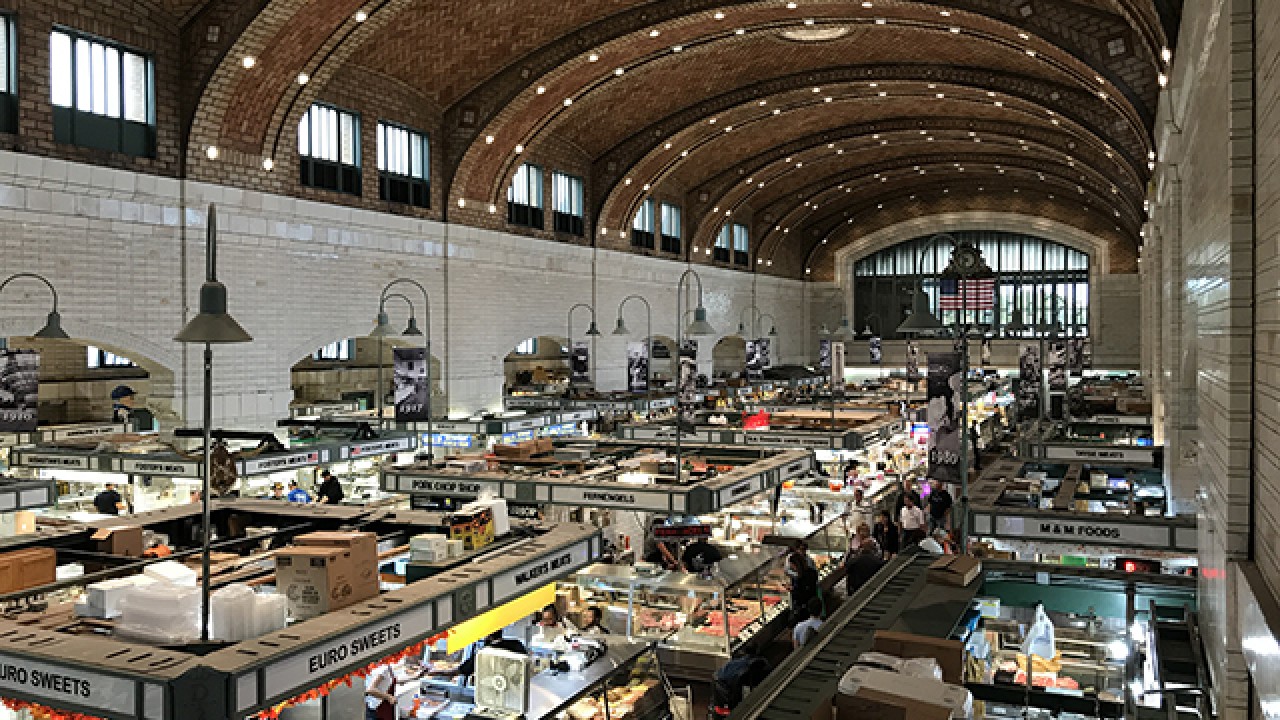 Two vendors leaving the West Side Market