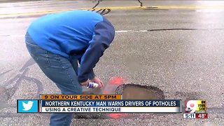 NKY man warns drivers of potholes