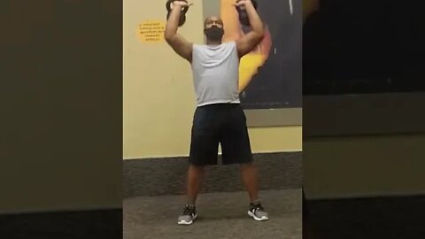 Squat into Dual Arm Overhead Press with Kettlebells