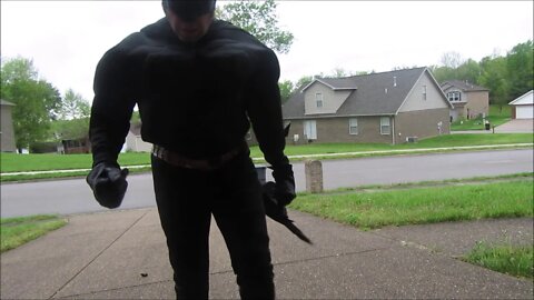 Batman takes out the garbage