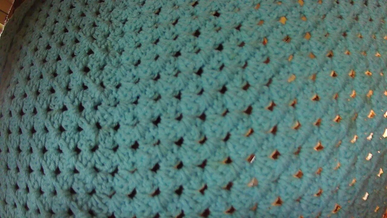 left handed Crochet Granny Square shawl.