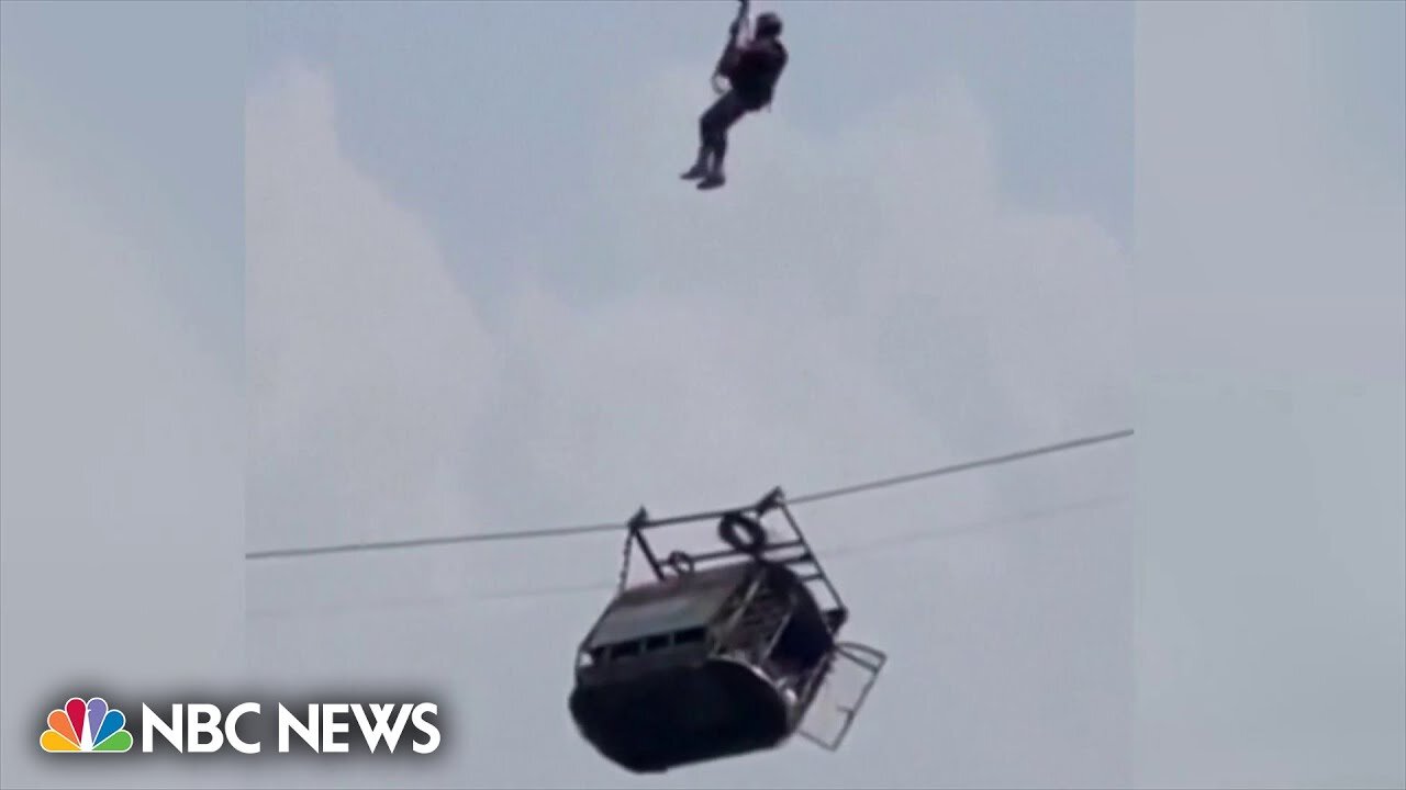 7 students and a teacher rescued from dangling cable car