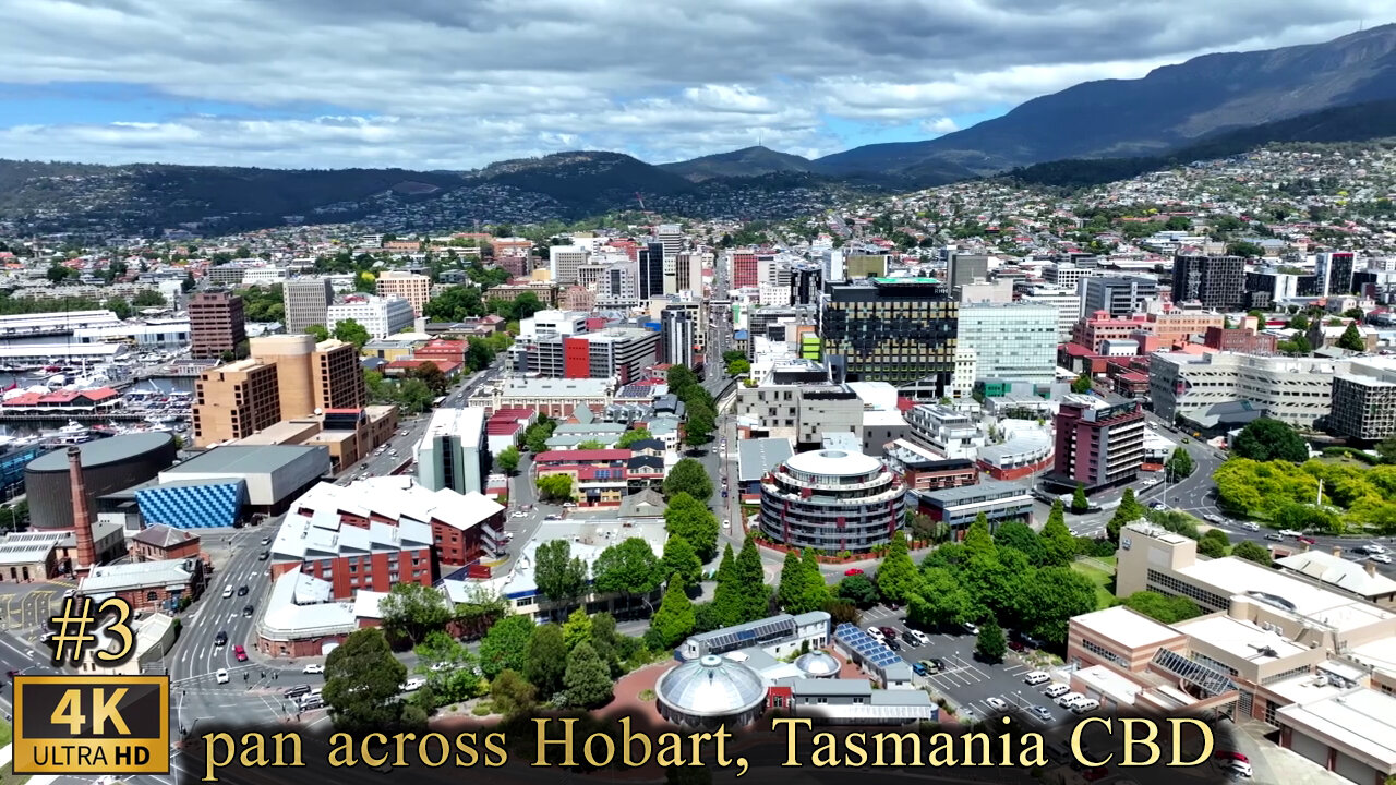 pan across Hobart, Tasmania CBD under Mount Wellington in summer - 4K