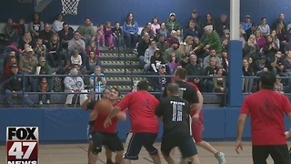 Meridian Twp. police host charity basketball game versus fire department