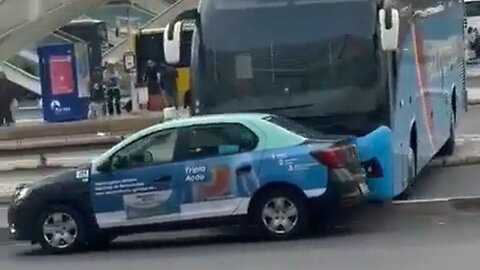 An Empty Bus Somehow Drives Across Parking Lot, Smashes Into Car Before Crashing Into Storefront