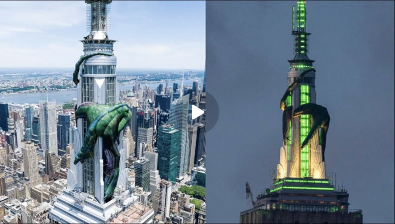 HOW'S THIS FOR A SIGN OF THE TIMES! THERE'S A DRAGON WRAPPED AROUND THE EMPIRE STATE BUILDING!