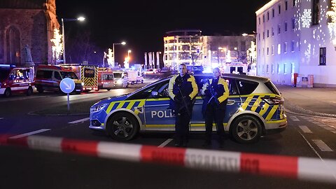 Injured carried from scene after car drove into shoppers at German Christmas market