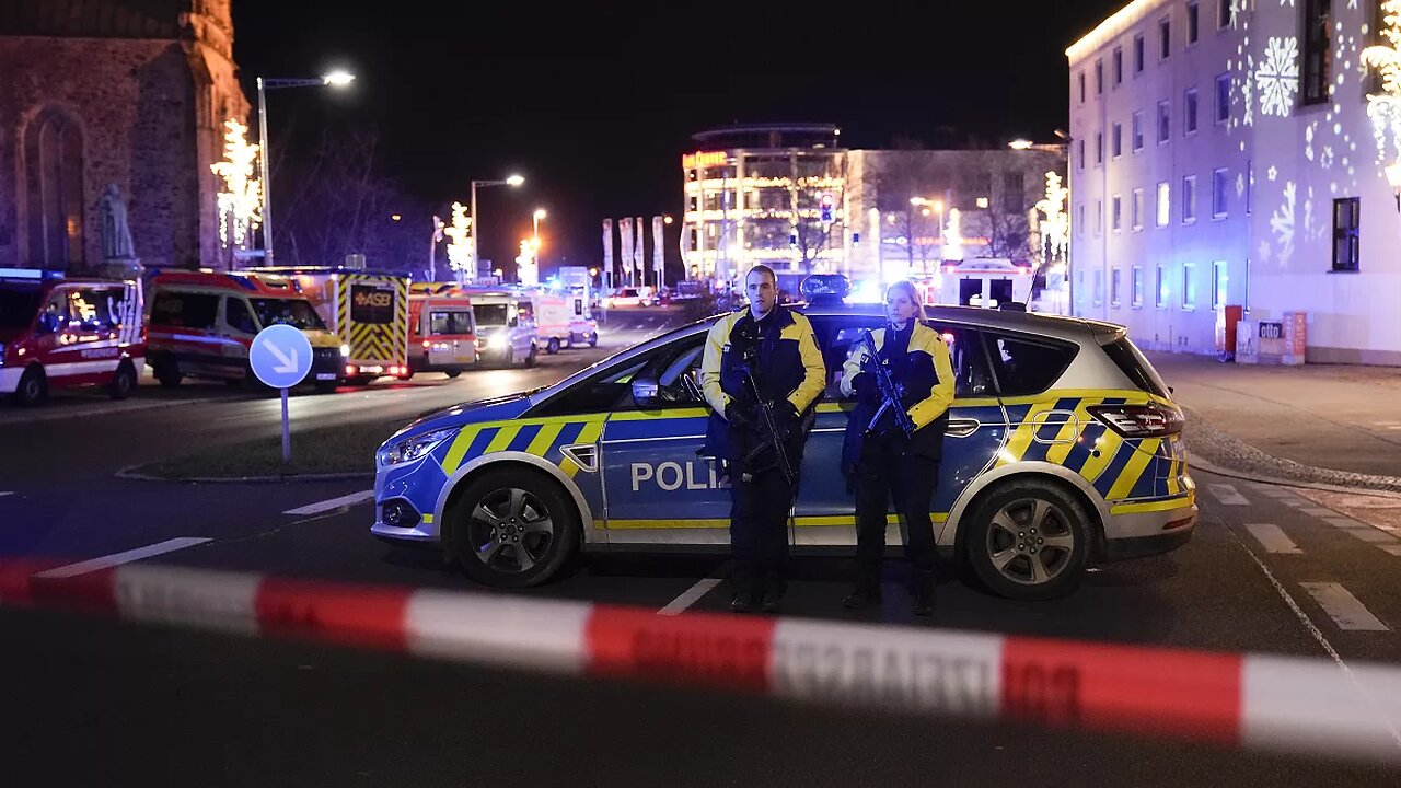 Injured carried from scene after car drove into shoppers at German Christmas market