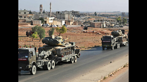 Convoy of military equipment and trucks leaving Sarin airfield in northern Syria