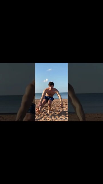 Doing a pistol squat at the beach in Canada