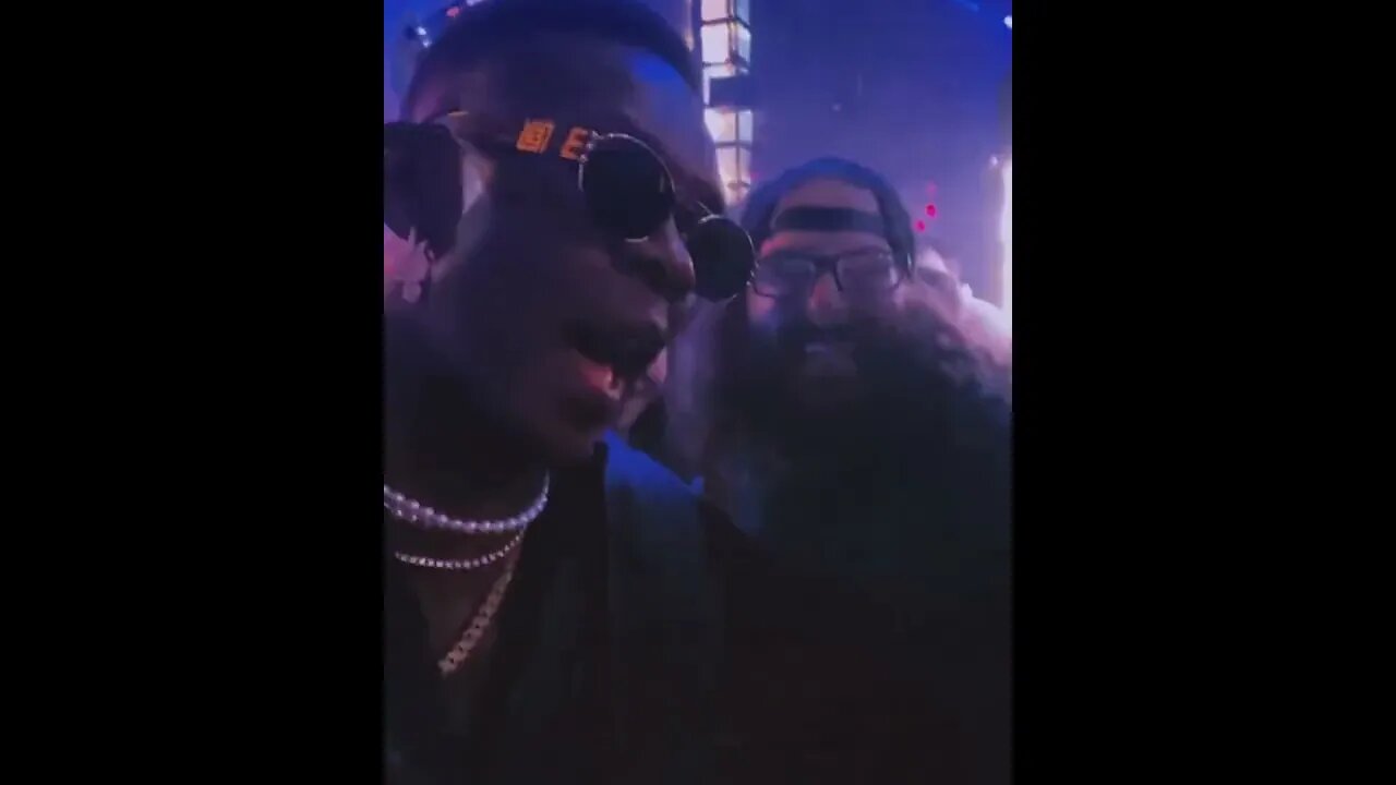 Israel Adesanya gets a kiss from his “boyfriend” Boogerbeard