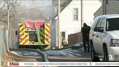 Omaha Fire Department battles house fire on Friday afternoon