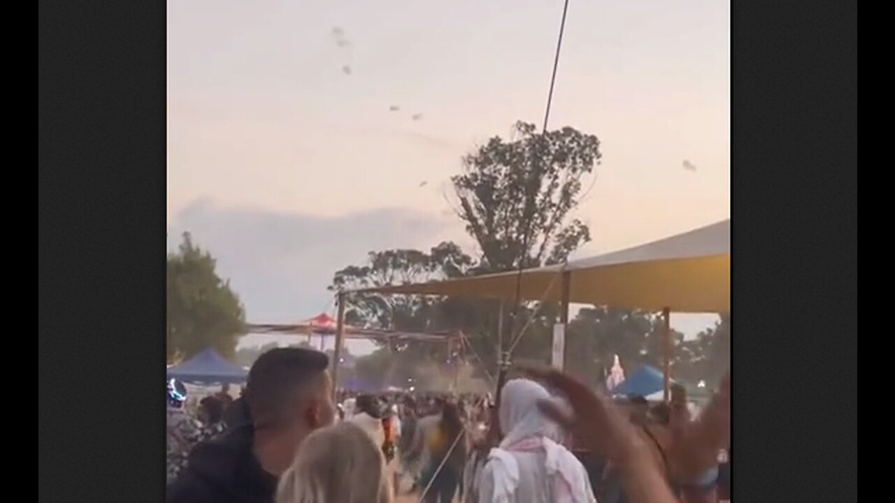 Israeli festival attendees partying before Hamas paragliders drop in & start firing