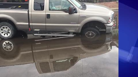 Customers looking for answers after truck gets stuck in parking lot hole