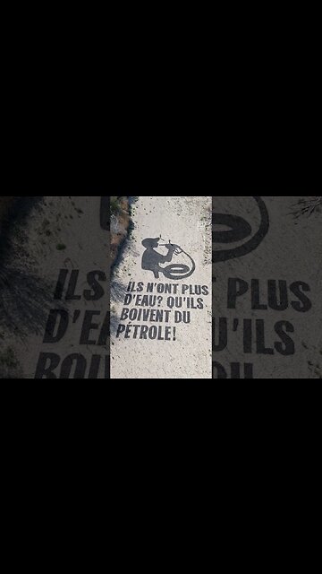 Activists Call Out French Oil Company With Painting in Dry Riverbed