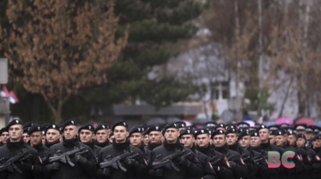 Bosnian Serbs celebrate banned holiday, praise Putin