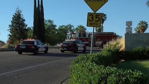 Bakersfield Police Department officer crashes into pickup on Panorama Drive