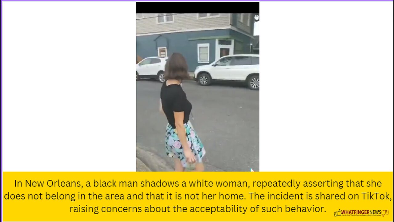 In New Orleans, a black man shadows a white woman, repeatedly asserting that she does not belong