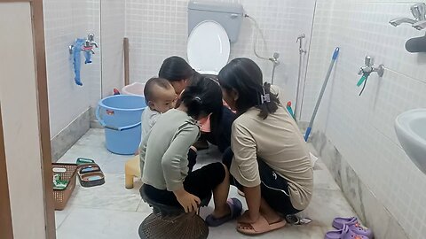 Marvin and Gracy washing their feet before going to bed.