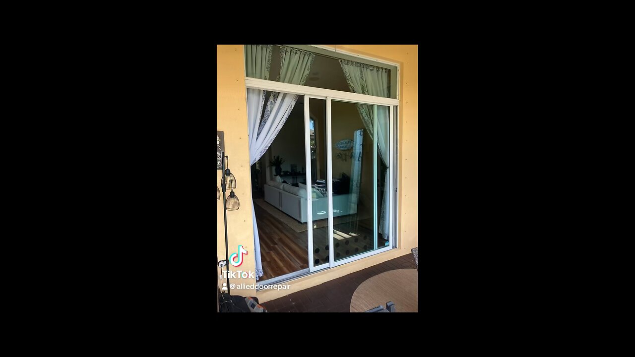 Sliding glass door repair; roller replacement and track refurbishing, in Parkland, Fl.