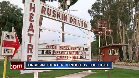 Lights shining from new development hurting drive-in business