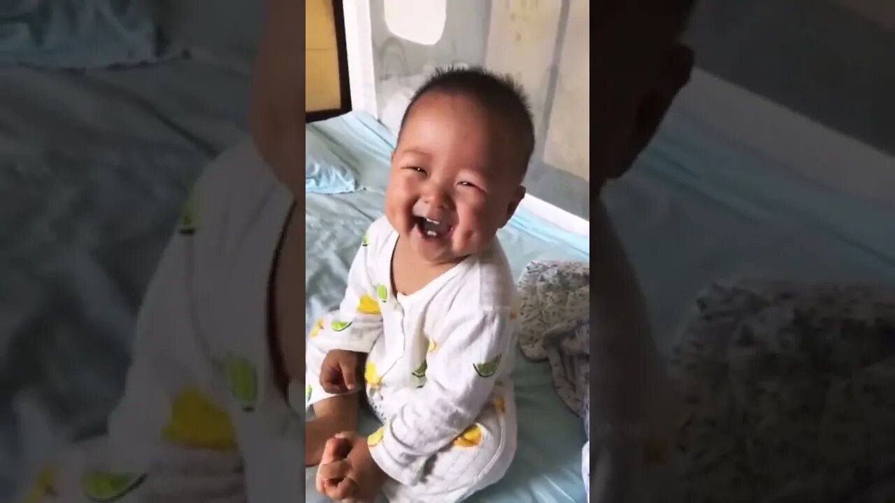 Funny babe laughing with excitement.