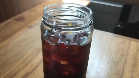 East side café offering every drink ordered to-go in a free reusable glass jar