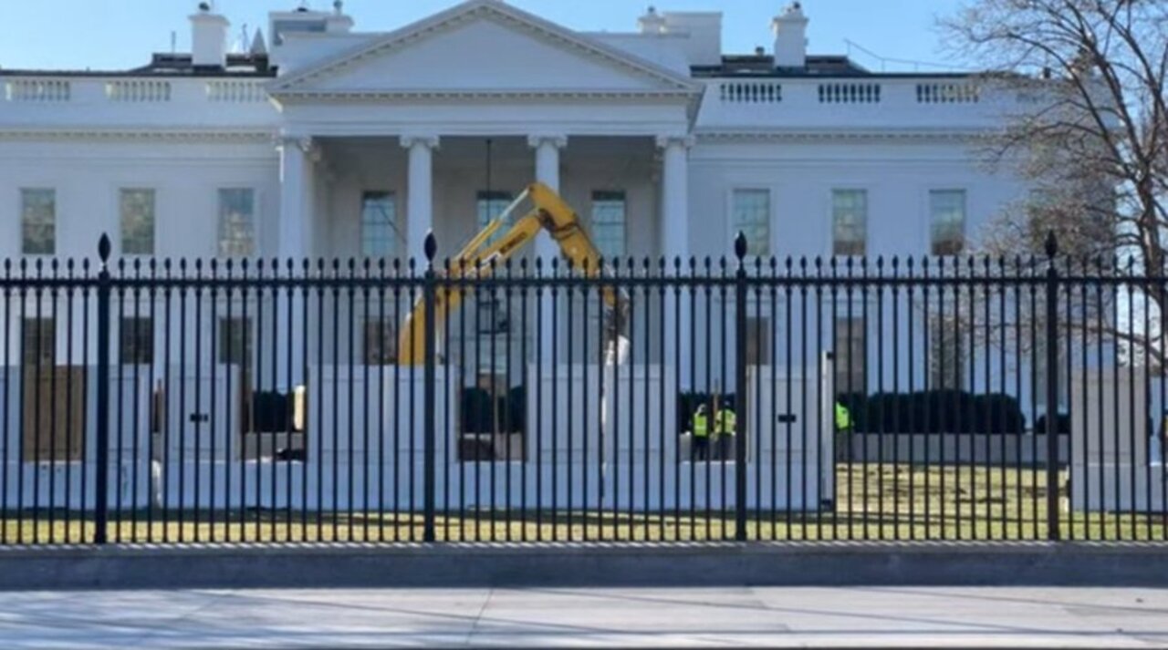 Why is a concrete wall being built around the white house?