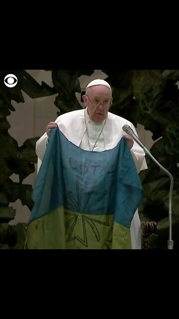 New- Pope kisses Ukraine flag.