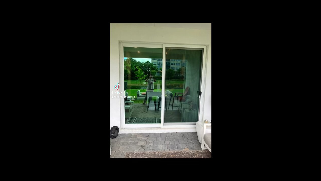 Hurricane impact sliding glass door repair; roller replacement and track refurbishing