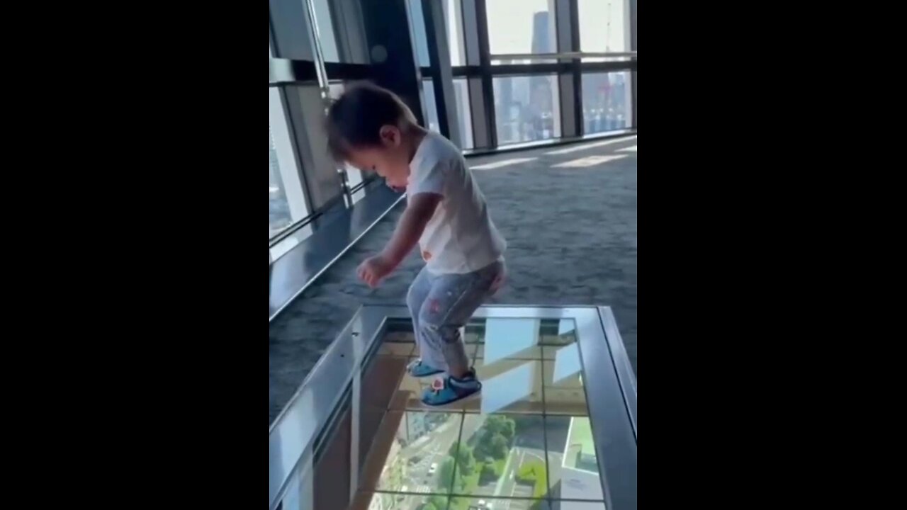 Baby walking on glass floor