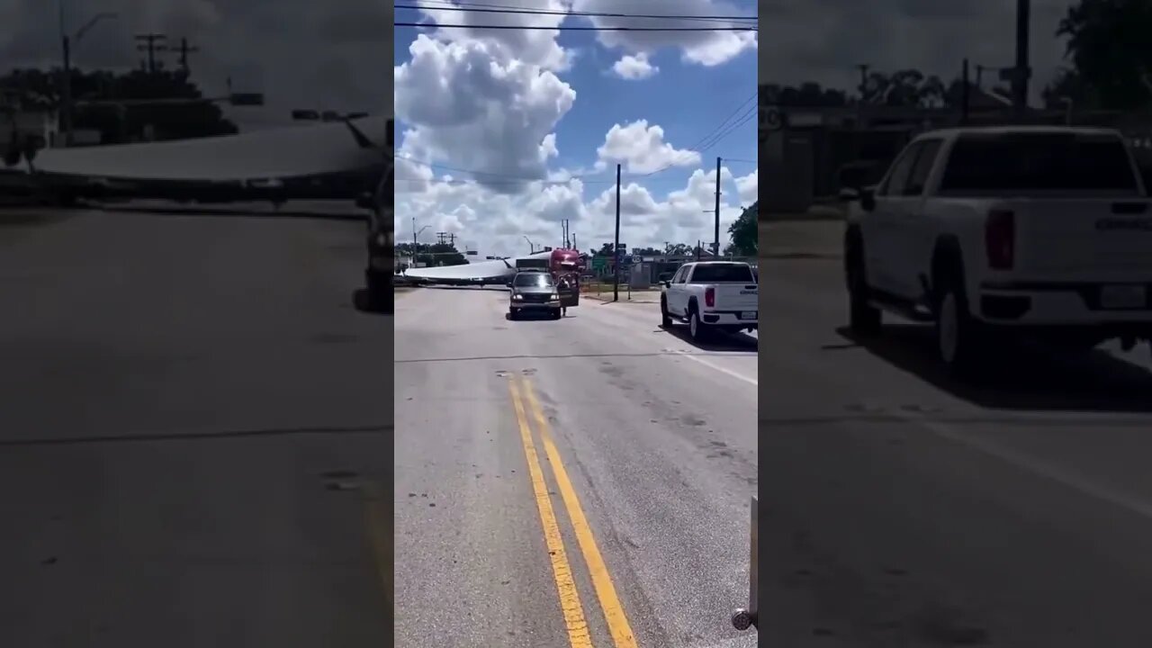 18 wheeler hauling a wind turbine gets stuck on the tracks😳#shorts #crazyvideo #traincrash