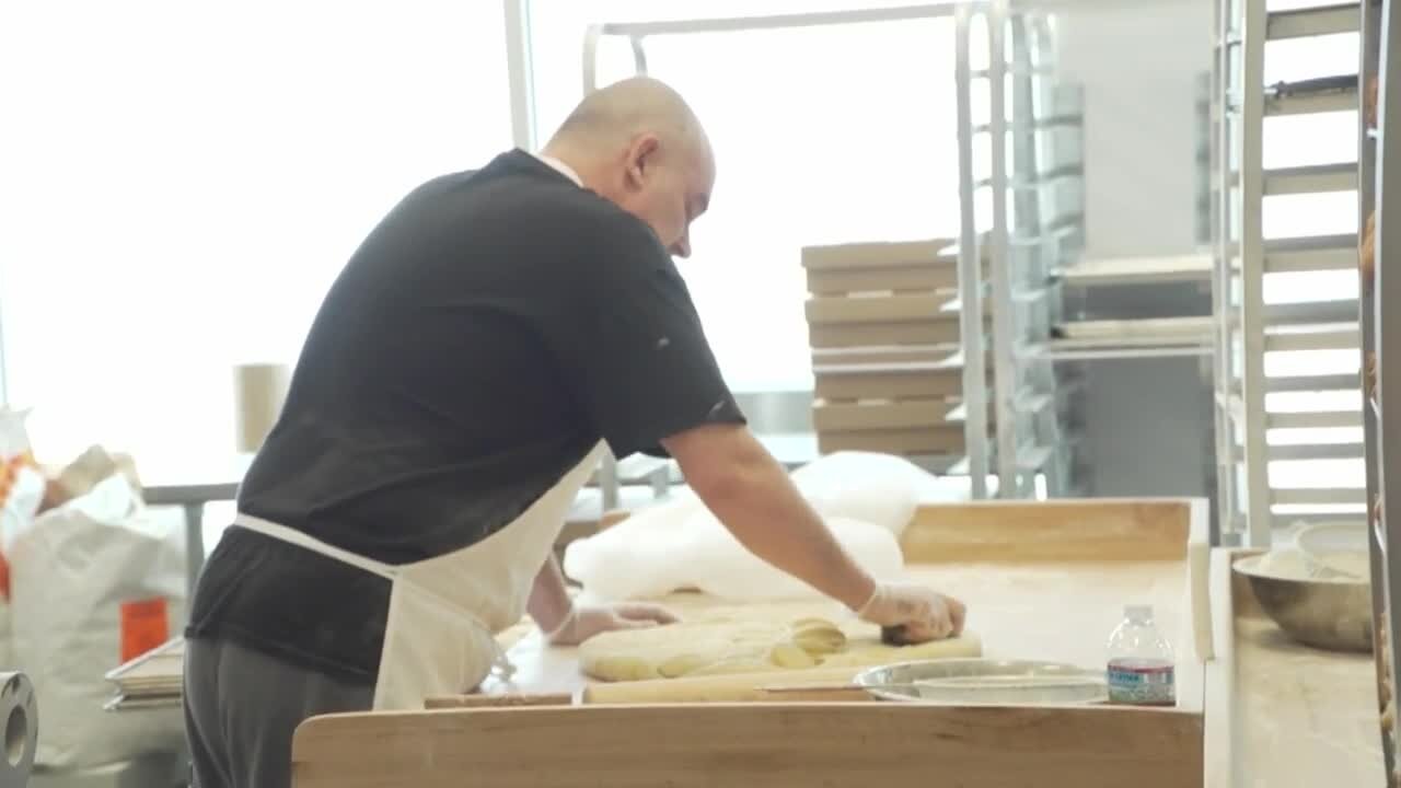 Emily Lampa learns to make Paczki’s at Paula’s Donuts