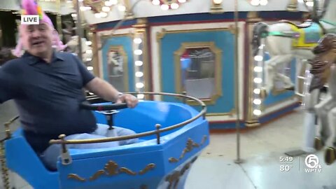 TA Walker rides tea cup at Palm Beach Zoo