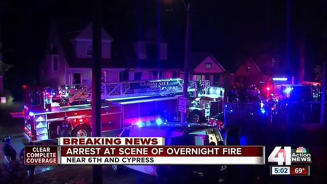 Police arrest man at scene of KCMO house fire